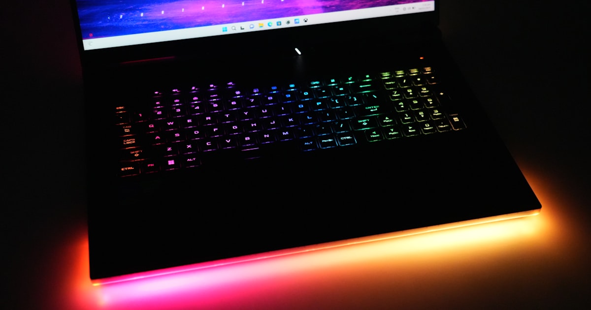 Best gaming laptop 2026 with a rainbow RGB backlit keyboard and glowing light bar
