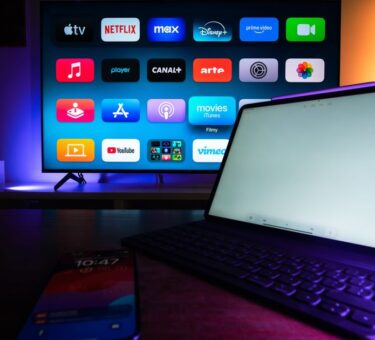TV showing global and regional streaming apps side by side, the region-locked catalogs a VPN to bypass geo restrictions opens up