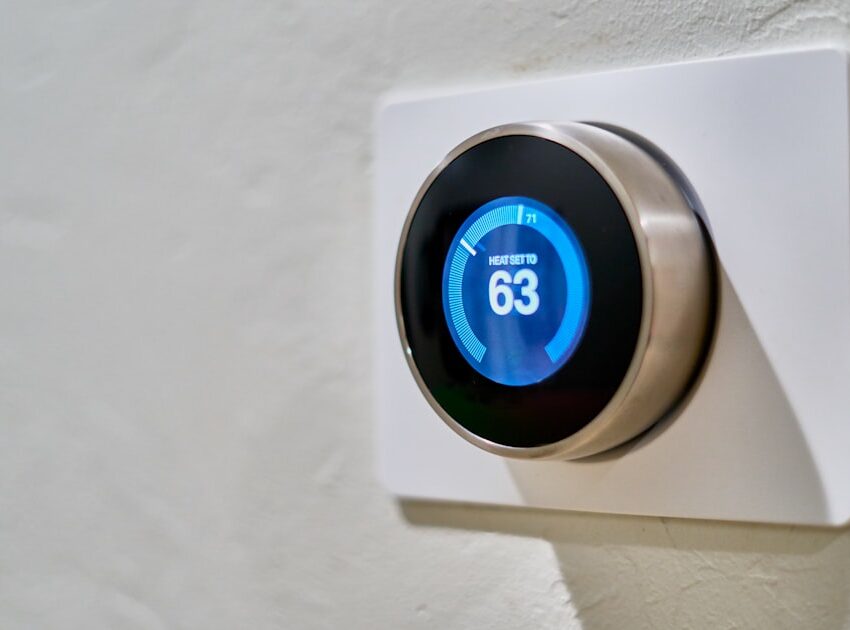 Smart thermostat on a wall showing a set temperature, the upgrade renters want without rewiring