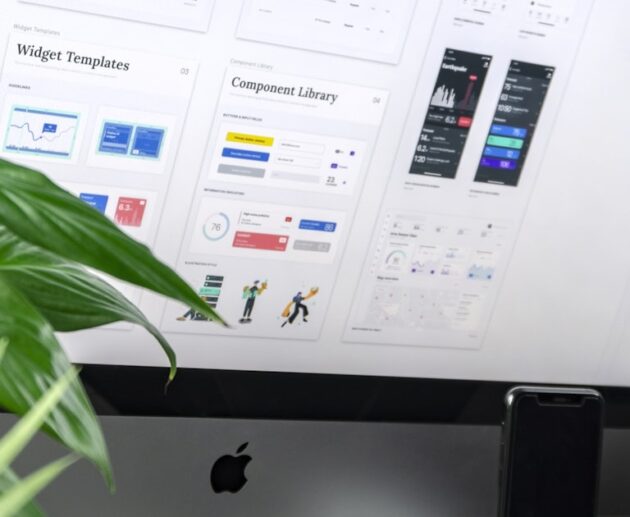 Template and component library open on a monitor, the building blocks every website builder guide describes