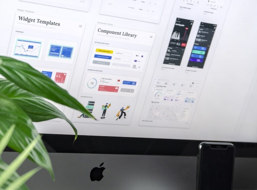Template and component library open on a monitor, the building blocks every website builder guide describes