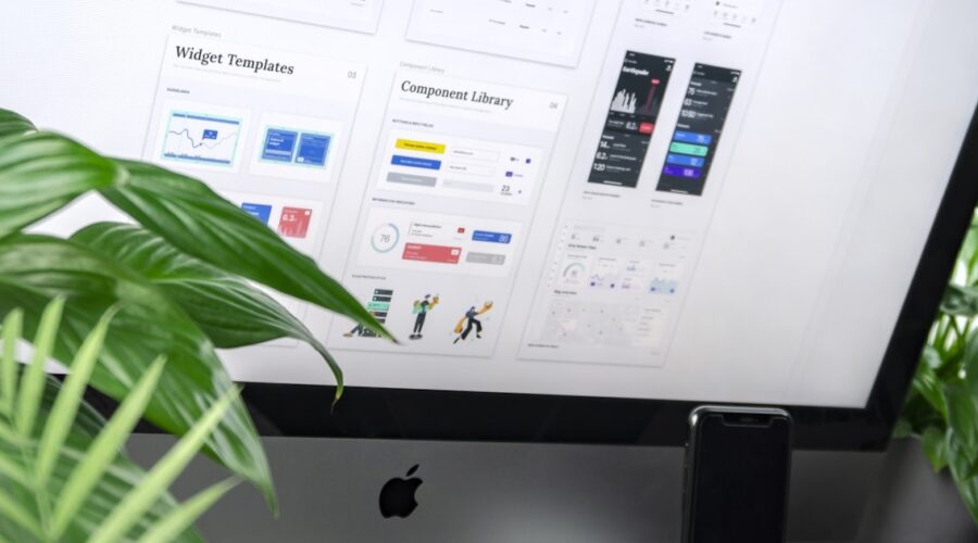 Template and component library open on a monitor, the building blocks every website builder guide describes