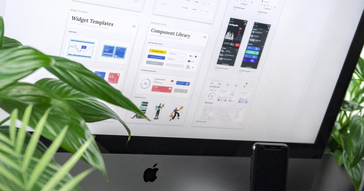 Template and component library open on a monitor, the building blocks every website builder guide describes