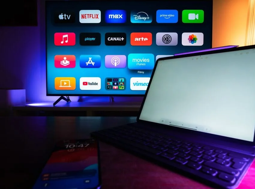 TV showing global and regional streaming apps side by side, the region-locked catalogs a VPN to bypass geo restrictions opens up