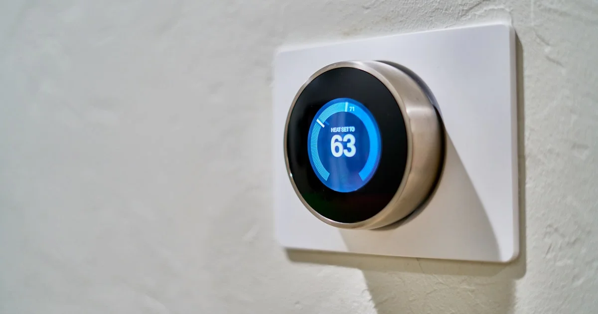 Smart thermostat on a wall showing a set temperature, the upgrade renters want without rewiring