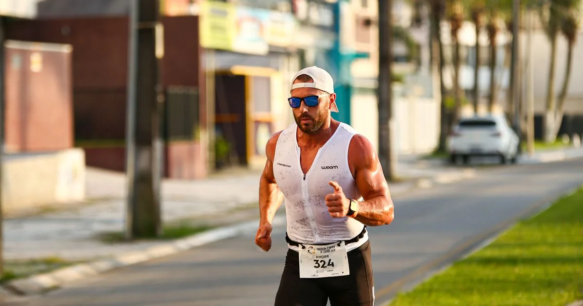 Endurance athlete running at hard race effort, the kind of session where a heart rate monitor chest strap is most accurate