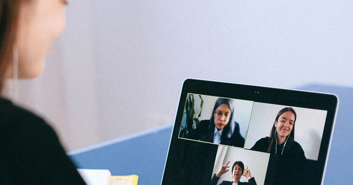 Laptop showing a group video call, the output that a Logitech webcam versus Razer webcam choice has to improve on