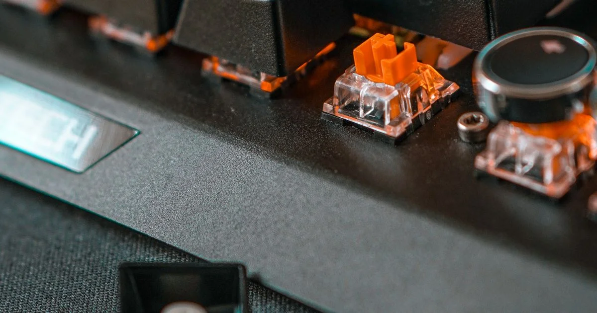 Exposed switch with the keycap removed, the part that decides the mechanical vs rgb keyboard question
