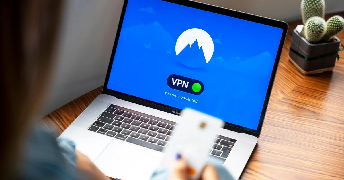 Laptop screen displaying a VPN app connected — illustrating NordVPN vs Proton VPN comparison