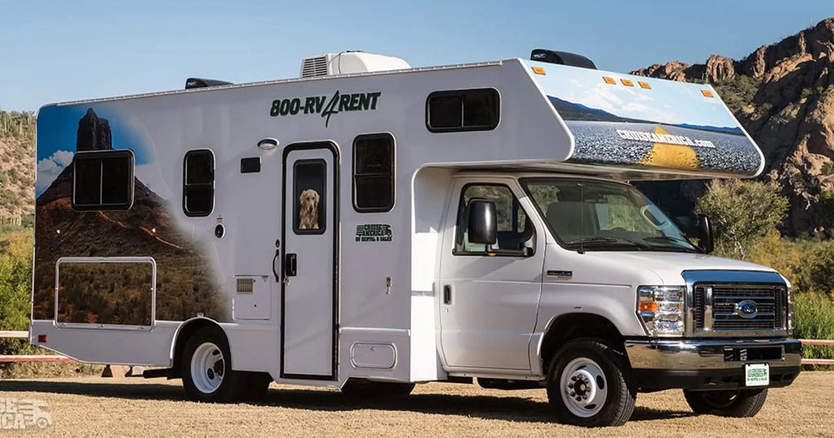 A Cruise America Standard rental motorhome parked in desert scenery, the vehicle at the center of the Rv rental vs hotel stays comparison